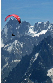 Annecy & Chamonix, France - Paragliding tour to the French Alps :: Paragliding in front of the granite towers of the Mont Blanc range, Chamonix, France during XC Camp 2022 by Antofaya Expeditions and Jarek Wieczorek
