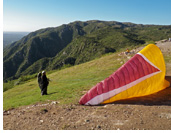 Cuchi Corral :: Cuchi Corral paragliding takeoff in La Cumbre, Argentina