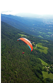Bassano del Grappa paragliding. Bassano paragliding playground - the green frontal range of the Alps and the Venetian plain. 