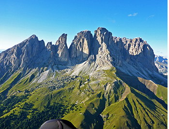Paragliding the Dolomites. The iconic Sassolungo massif just north of the Col Rodella takeoff.