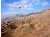 Cerro Toro - Paragliding over plateou of Cerro Torro masive, Pisagua, Atacama Desert, Chile - Pilot: Ken Hudonjorgensen, USA - Fly Atacama 2008 organizer