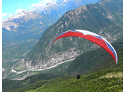 Paragliding toward Bovec valley, Julian Alps, Slovenia