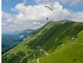 Paragliding along Stol range, Kobarid, Julian Alps, Slovenia