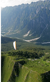 Musi Range::Wild Monte Musi range across the valley in Italy as seen on an XC flight from Slovenia, Parco Regionale delle Prealpi Giulie, Italy - Slovenia 2012 - The Joy of XC - Paragliding Adventure Tour in The European Alps